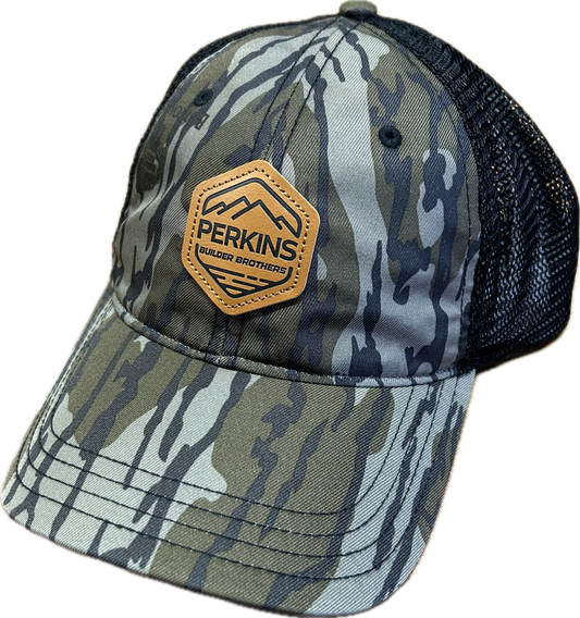 Debossed Faux Leather Patch - Richardson 111 Relaxed Trucker Hat - Bottomland Camo/Black - Perkins Builder Brothers