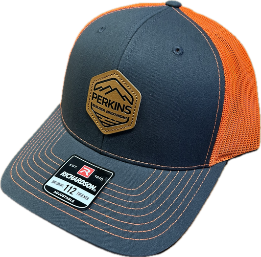 Debossed Faux Leather Patch - Richardson 112 Snapback Trucker Hat - Charcoal/Safety Orange - Perkins Builder Brothers