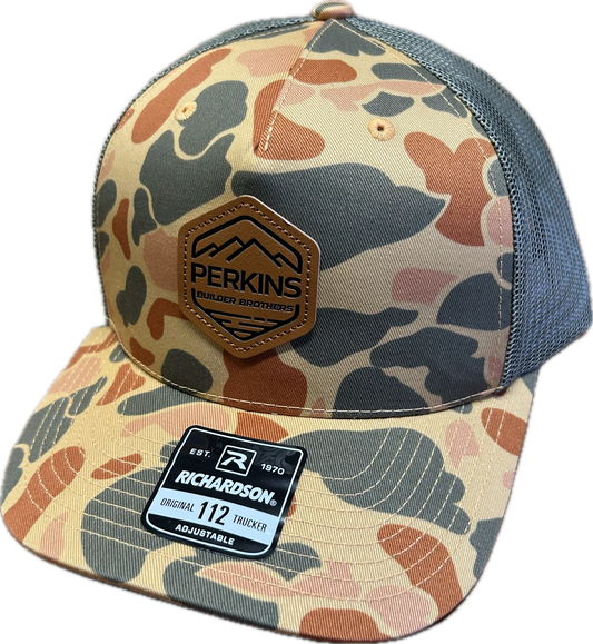 Debossed Faux Leather Patch - Richardson 112 Snapback Trucker Hat - Sienna Duck Camo/Loden - Perkins Builder Brothers