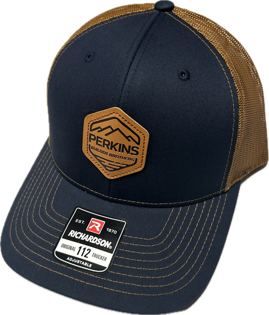 Debossed Faux Leather Patch - Richardson 112 Snapback Trucker Hat - Navy/Caramel - Perkins Builder Brothers